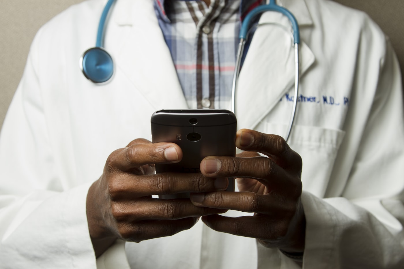Doctor reviewing results on a phone