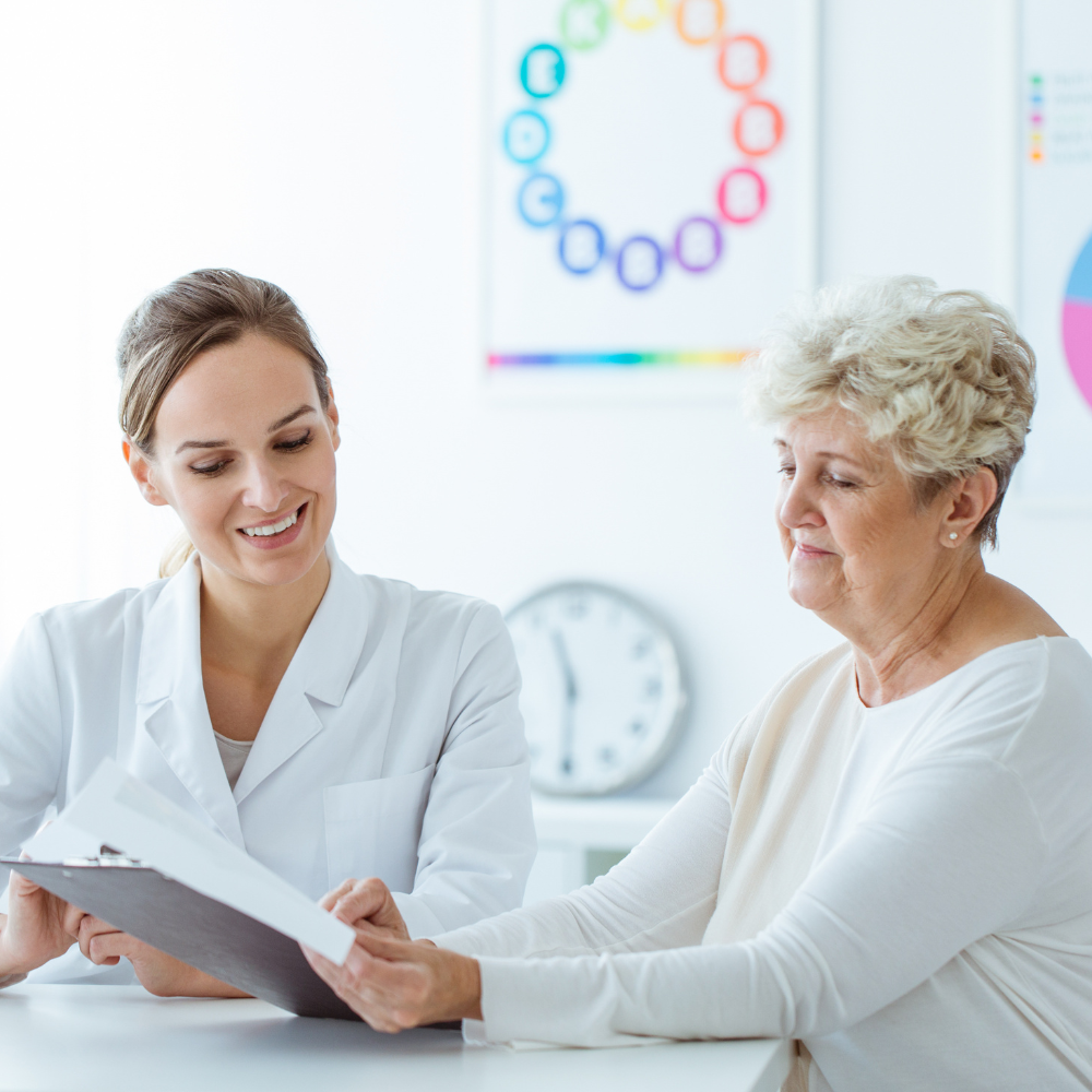 Doctor reviewing a plan with a smiling patient